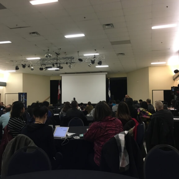 A full conference room before the pandemic.